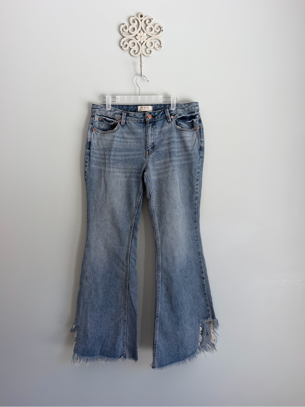 We The Free Light Blue Flare Jeans with Frayed Hem